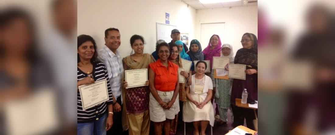 A group of trainers having their certificates
